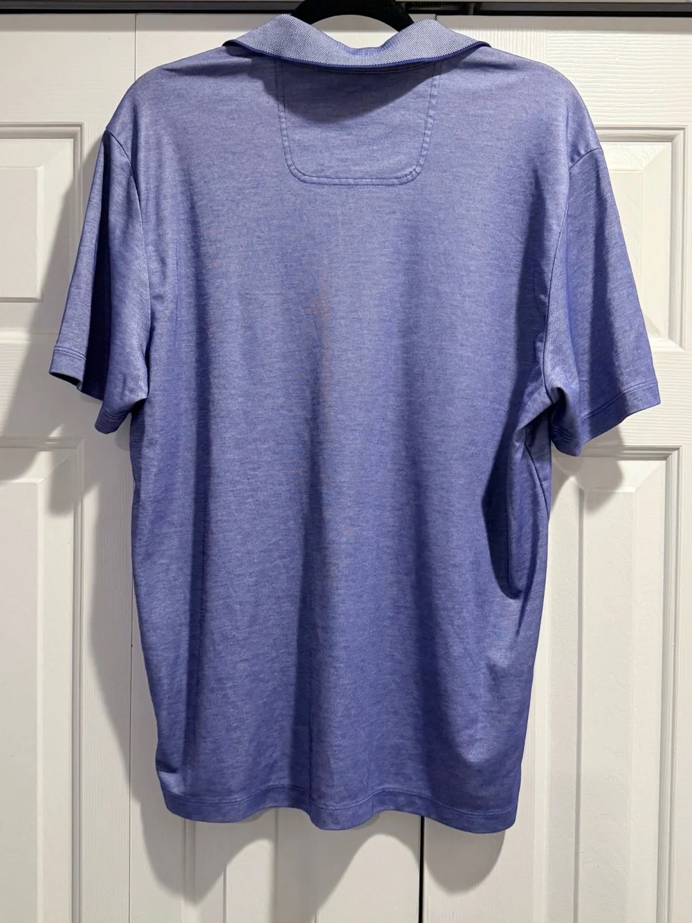 Tommy Bahama Men's Blue Heather Polo Shirt with Chest Pocket. #0083
